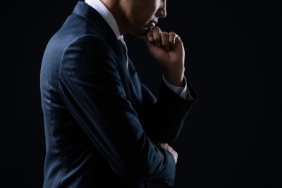 Businessman thinking about something seriously