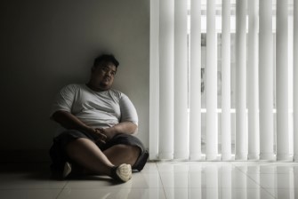 Picture,Of,Lonely,Fat,Man,Looks,Daydream,While,Sitting,Near